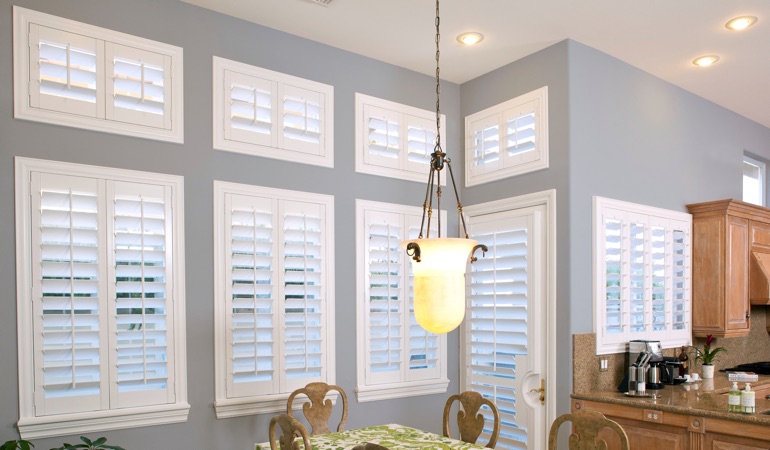 White plantation shutters in kitchen